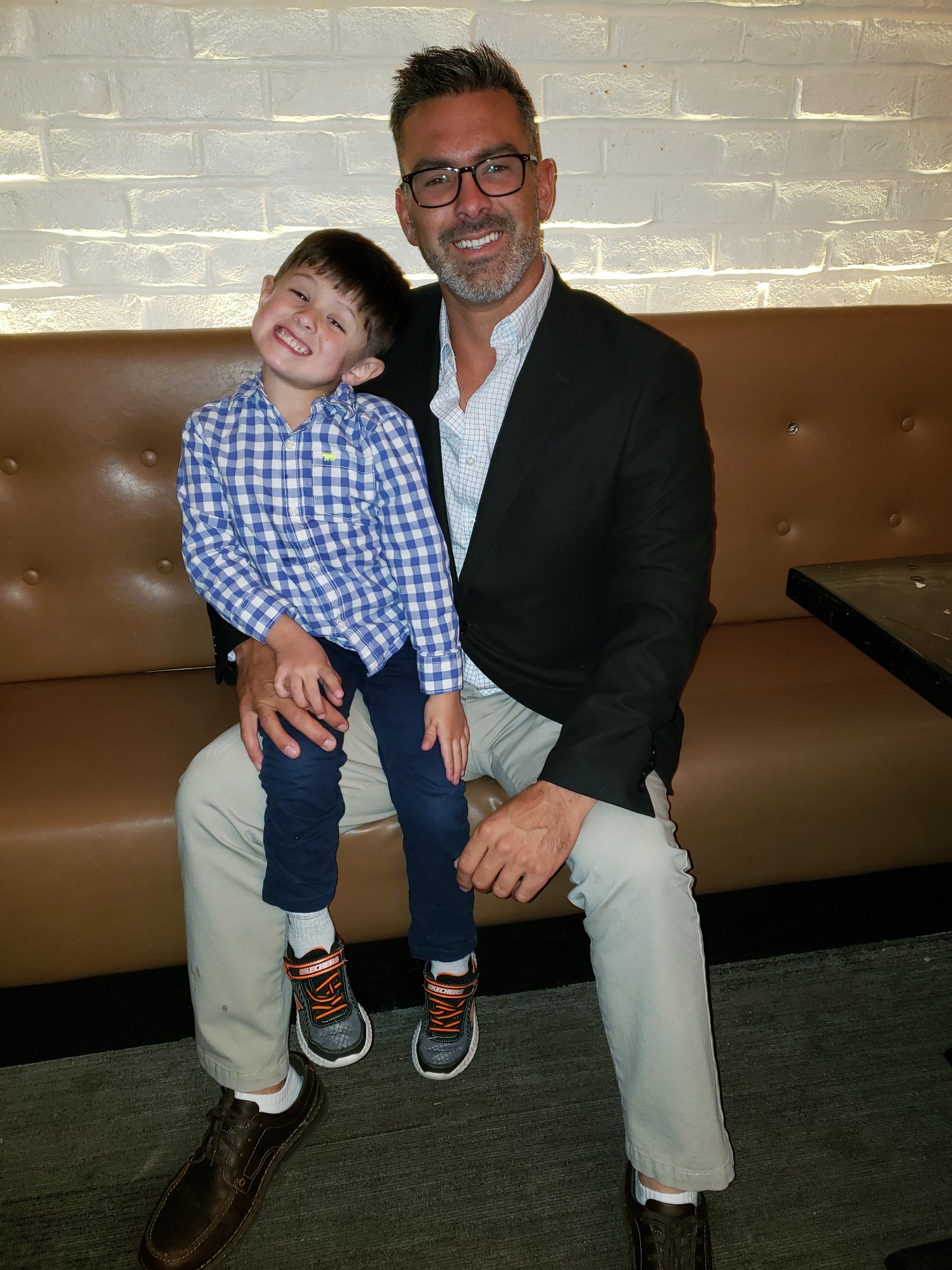 Nick Ritter sharing a smile with his son